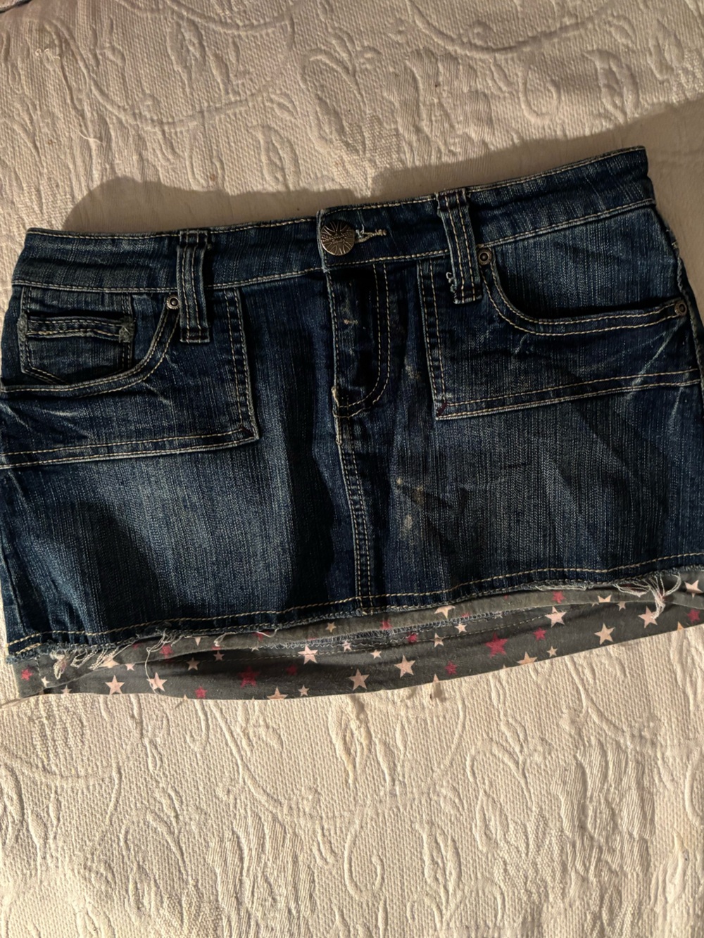 Y2K lowrise denim mini skirt with star trims